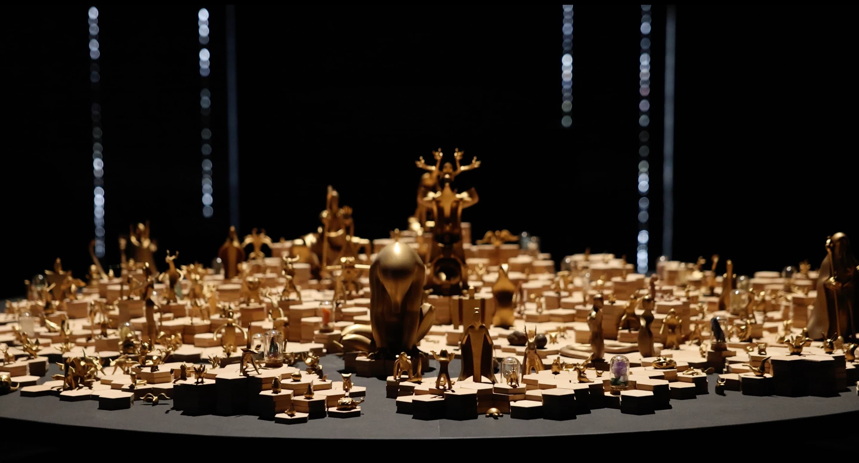 Golden figures and terrain in the Shan Hai World ensemble